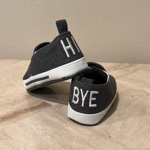 Adorable baby shoes with message on heel